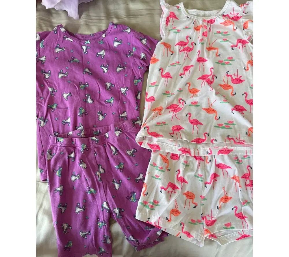 Carters purple rollar skate and white flamingo pajamas size 7 an 8